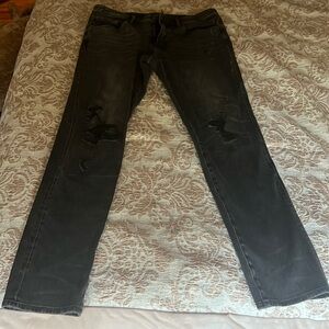 Charcoal Jeans ripped knees. Gently used. American Eagle